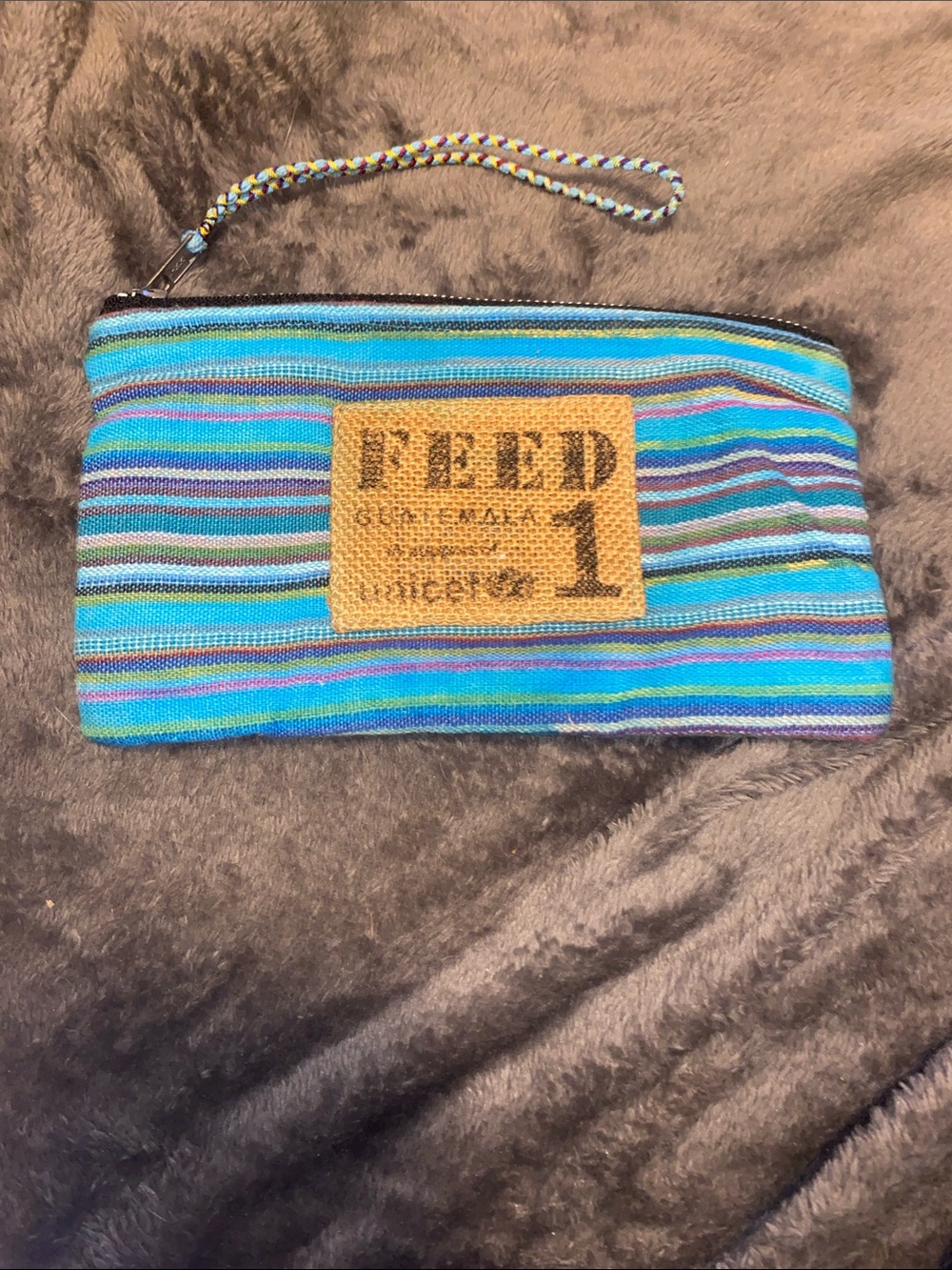 FEED by Nest Artisans in Guatemala Turquoise Striped Wristlet Clutch